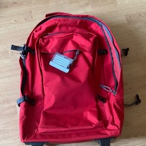 Red luggage/ carry on bag